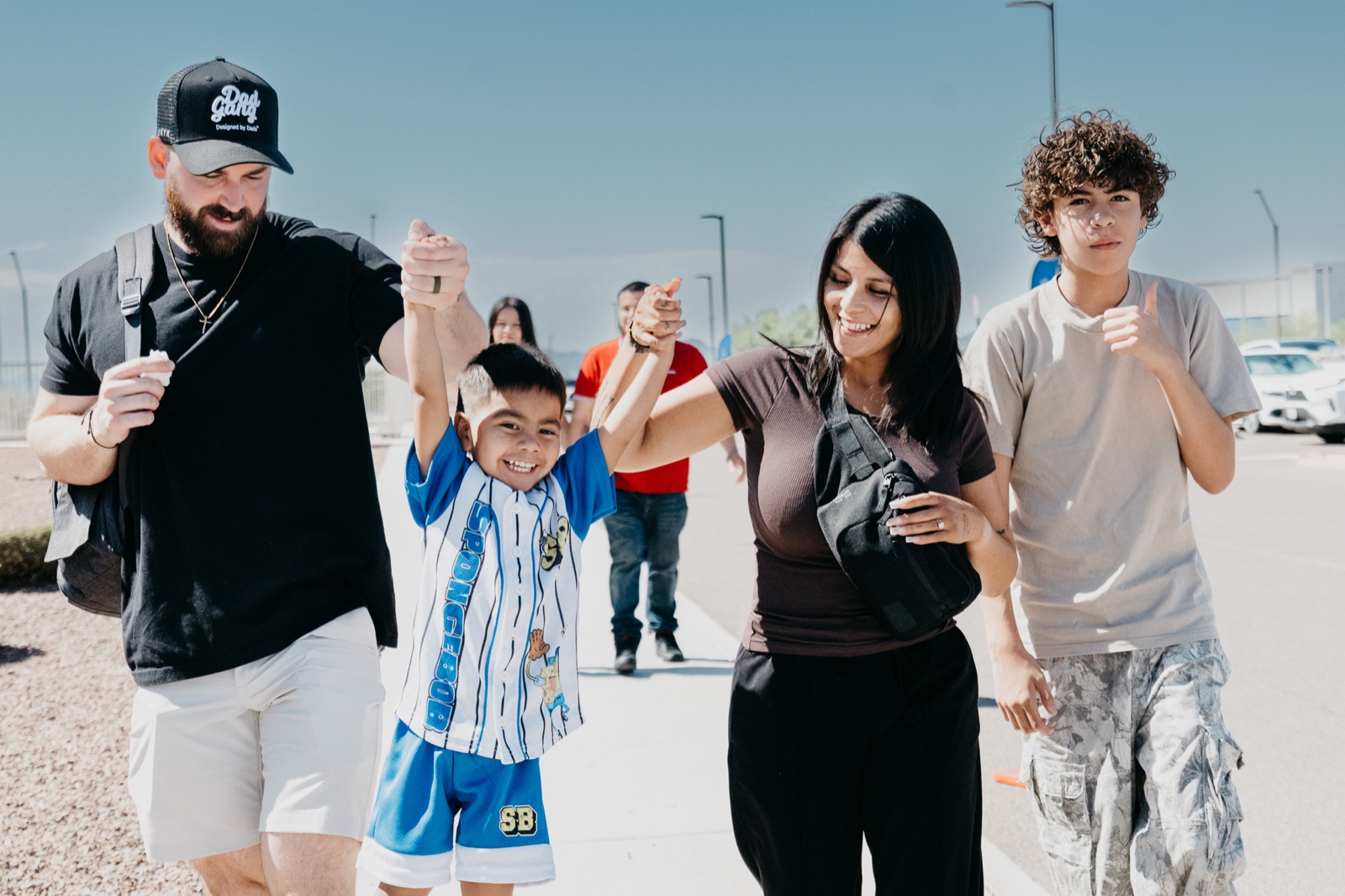 A family arriving at Social Church together.